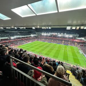 a stadium full of people watching a soccer game